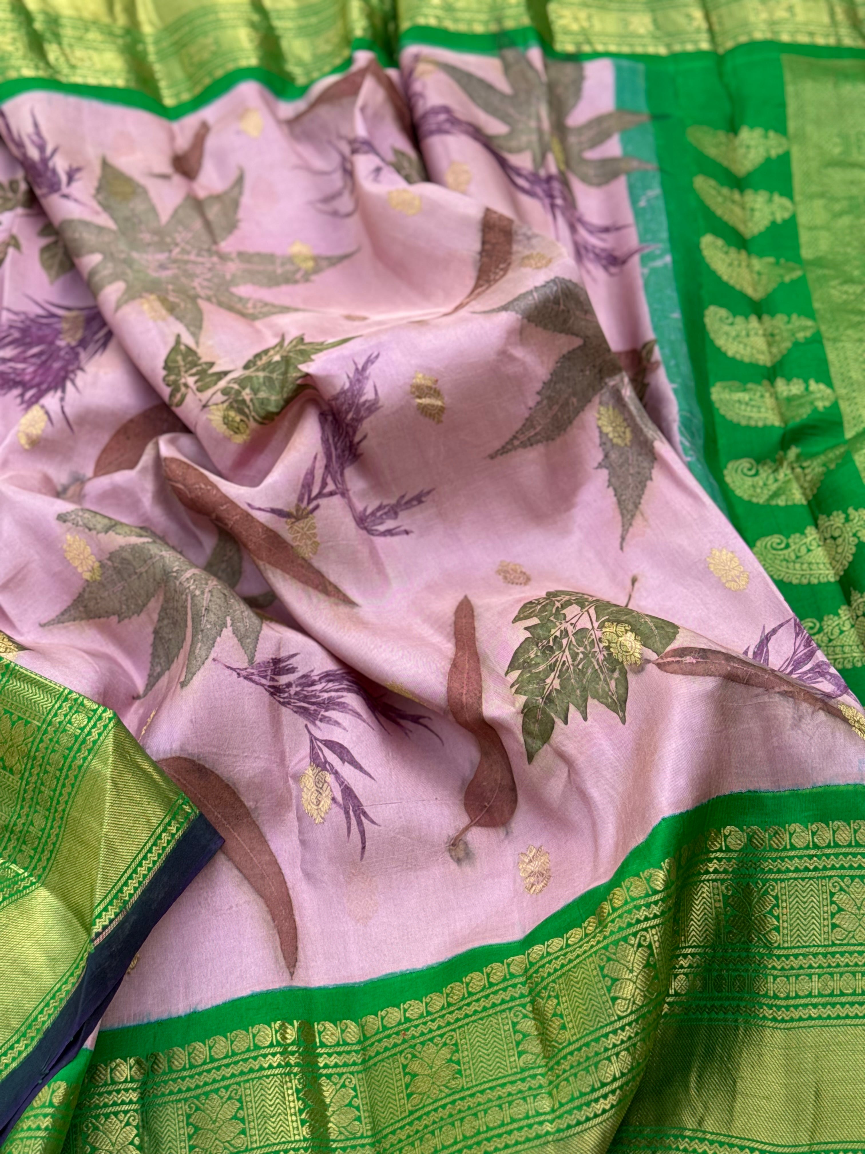 A gorgeous natural ecoprints done on mauve pink with green kuttu gadwal silk saree