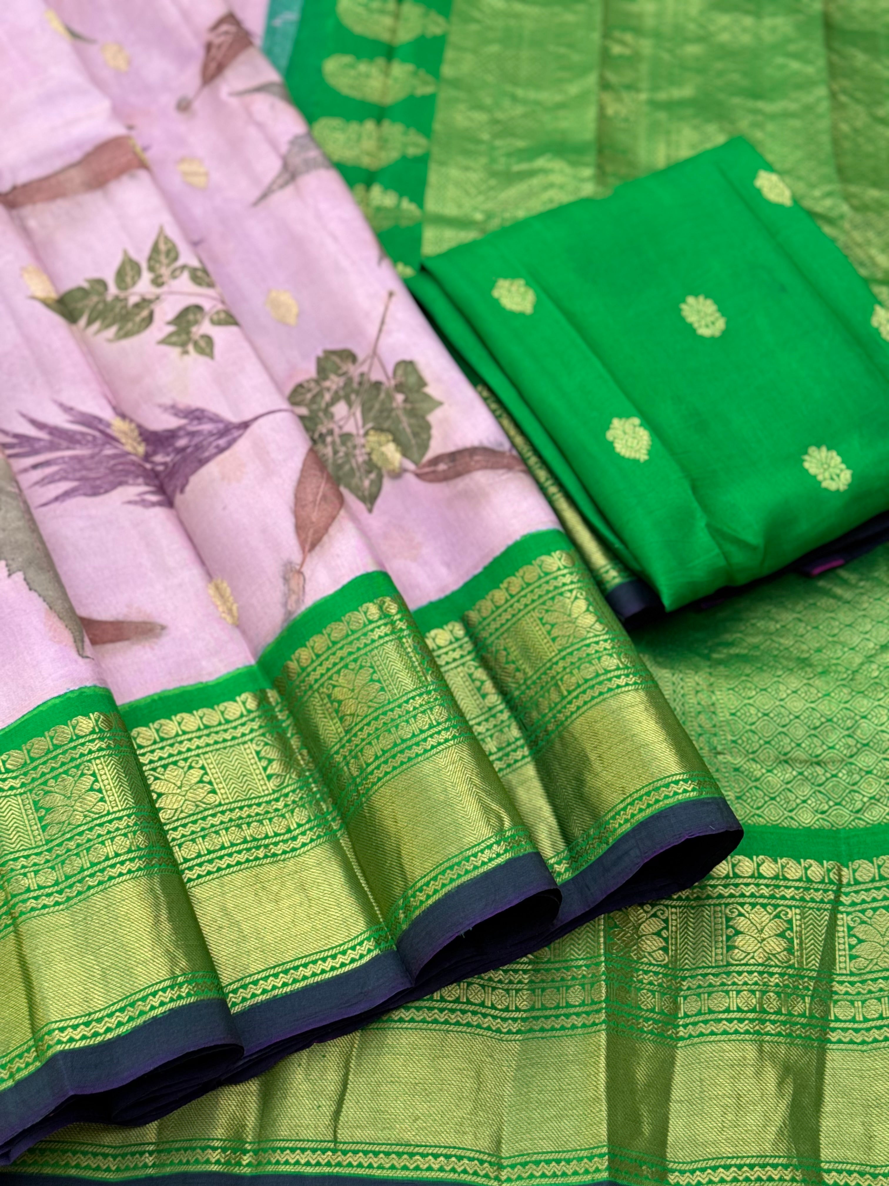 A gorgeous natural ecoprints done on mauve pink with green kuttu gadwal silk saree