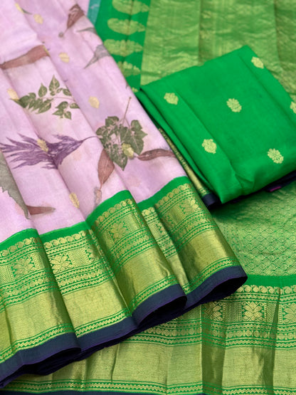 A gorgeous natural ecoprints done on mauve pink with green kuttu gadwal silk saree