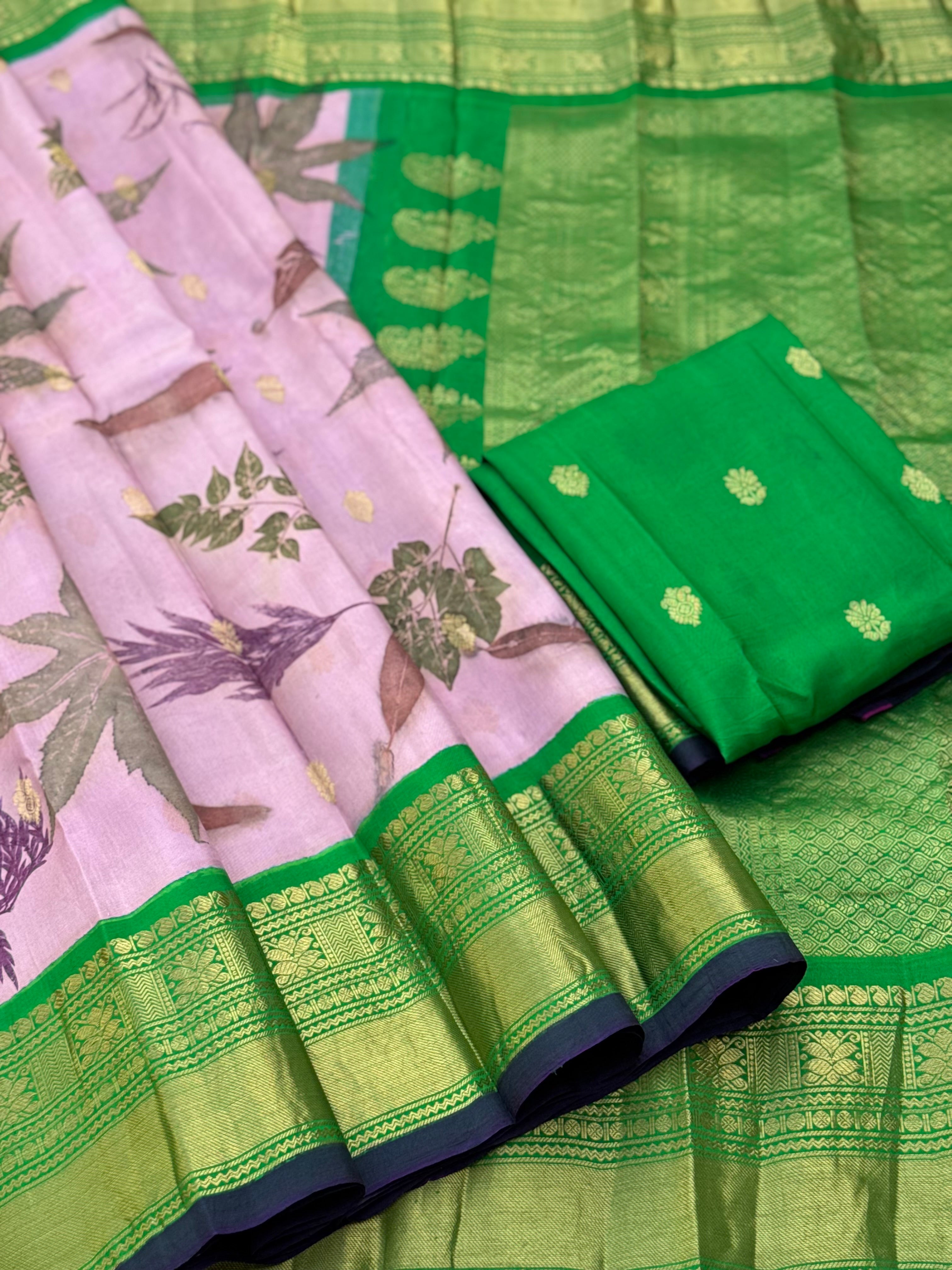A gorgeous natural ecoprints done on mauve pink with green kuttu gadwal silk saree