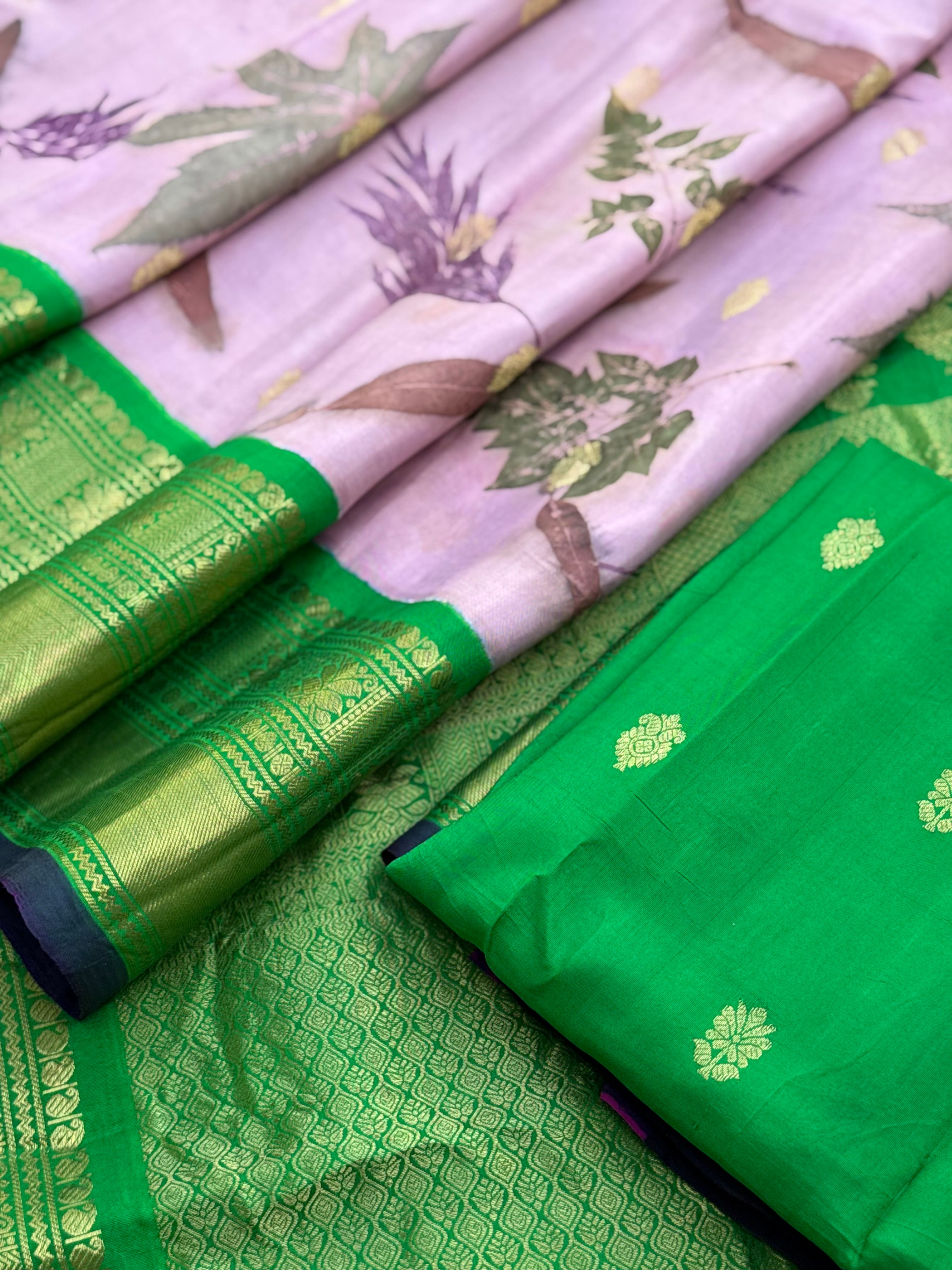 A gorgeous natural ecoprints done on mauve pink with green kuttu gadwal silk saree