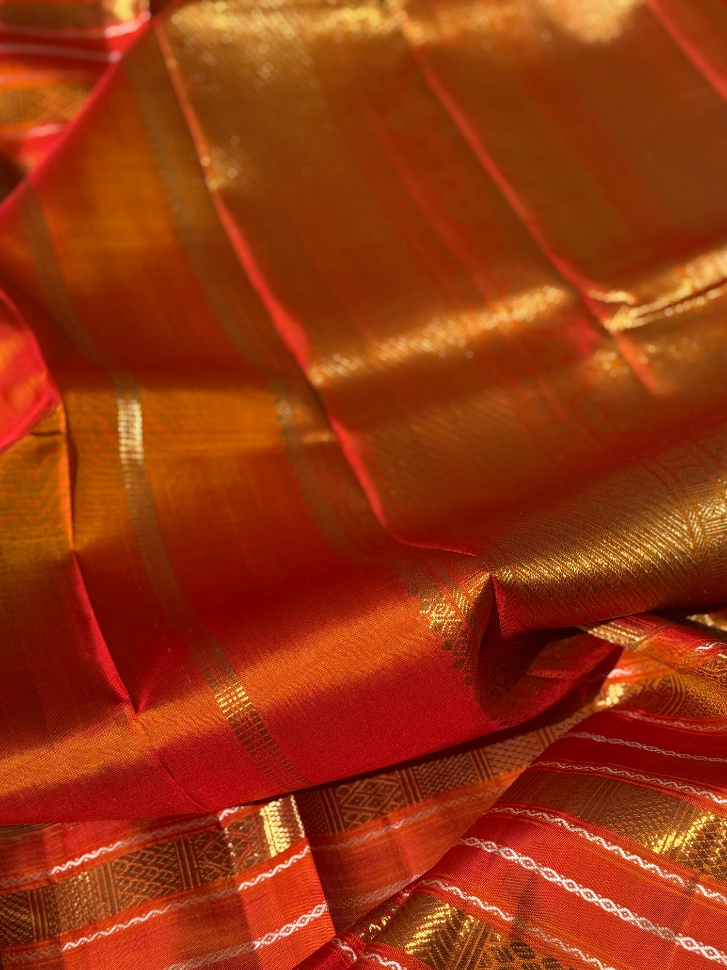 A Fern Green with orange masterpiece honeycomb motif korvai kanchivaram silk saree