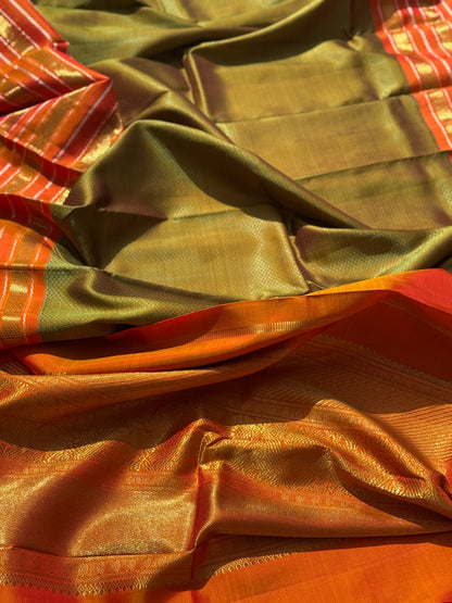 A Fern Green with orange masterpiece honeycomb motif korvai kanchivaram silk saree