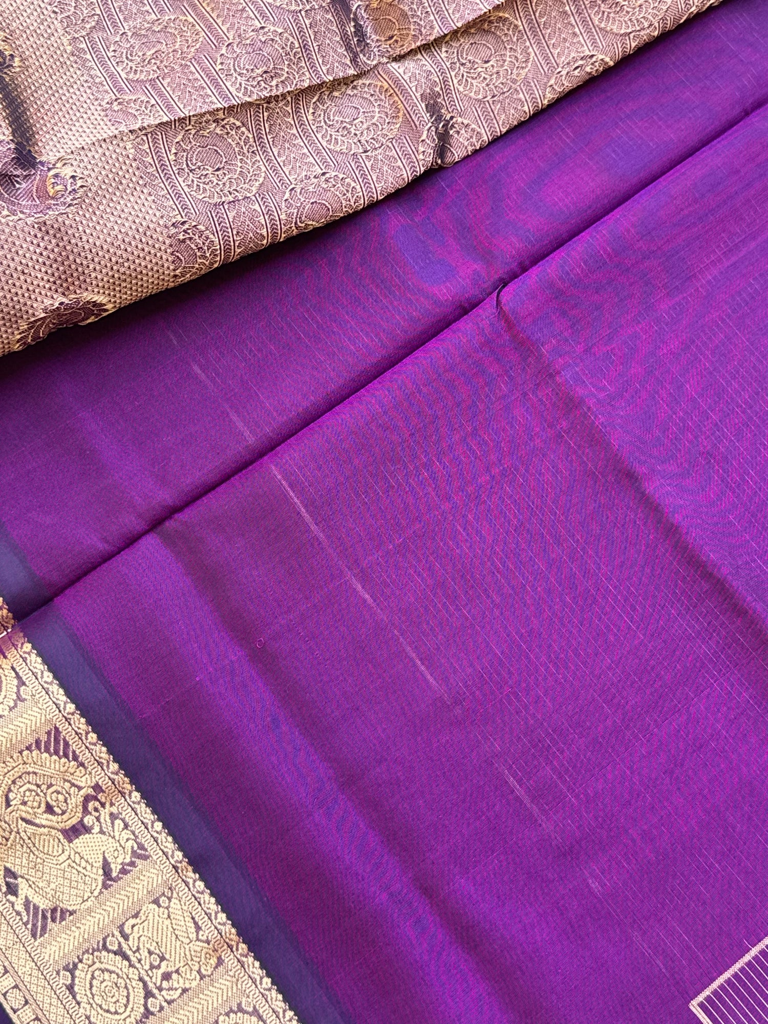 A gorgeous purple shade handwoven Oosi zari checks kanchi silk cotton saree