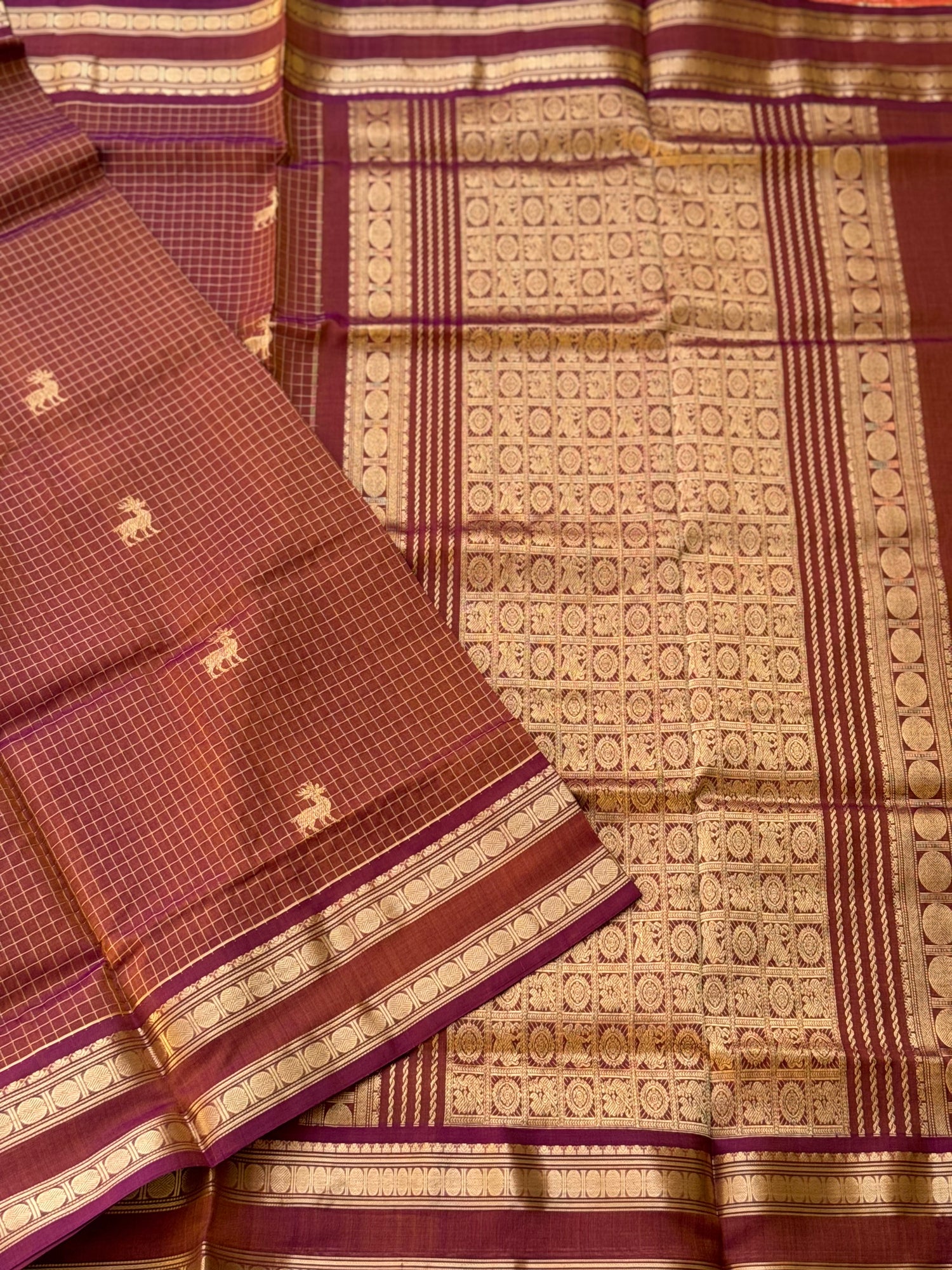 A gorgeous rust brown shade handwoven zari stripes kanchi silk cotton saree