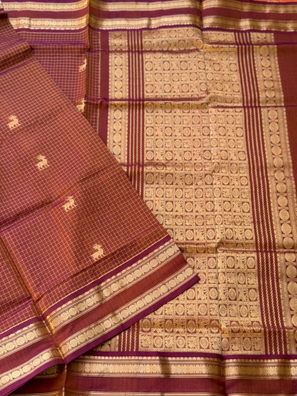 A gorgeous rust brown shade handwoven zari stripes kanchi silk cotton saree