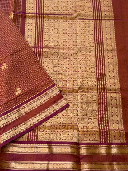 A gorgeous rust brown shade handwoven zari stripes kanchi silk cotton saree