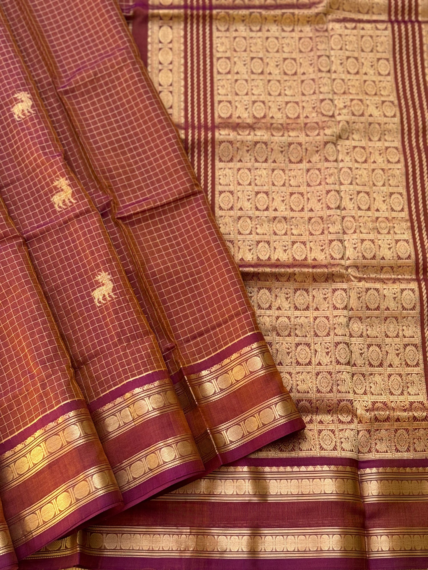 A gorgeous rust brown shade handwoven zari stripes kanchi silk cotton saree