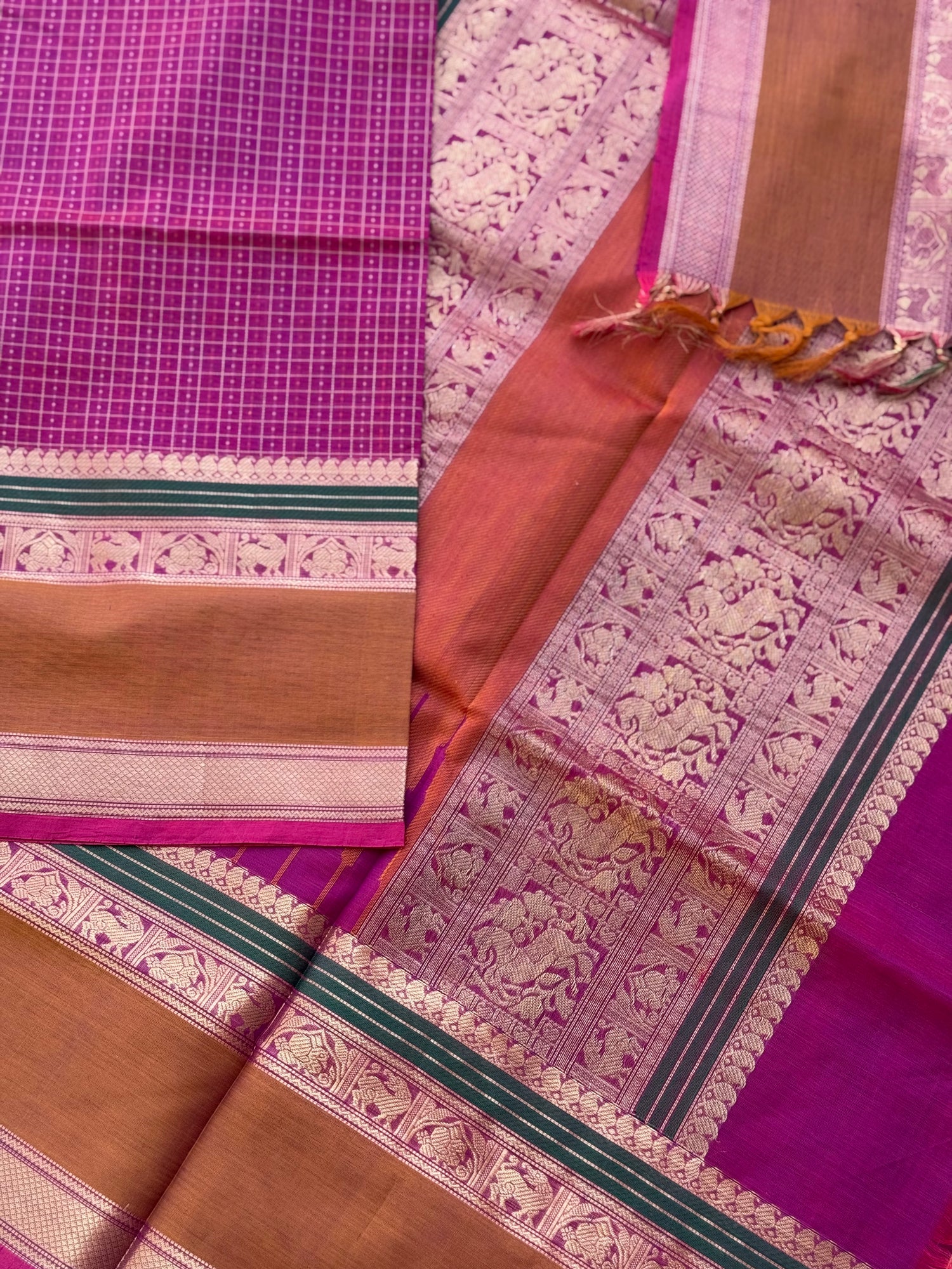 A gorgeous deep pink with lakhshadeepam buttas silk cotton saree