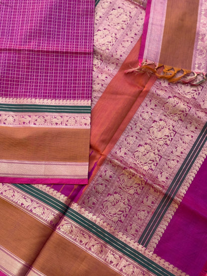 A gorgeous deep pink with lakhshadeepam buttas silk cotton saree