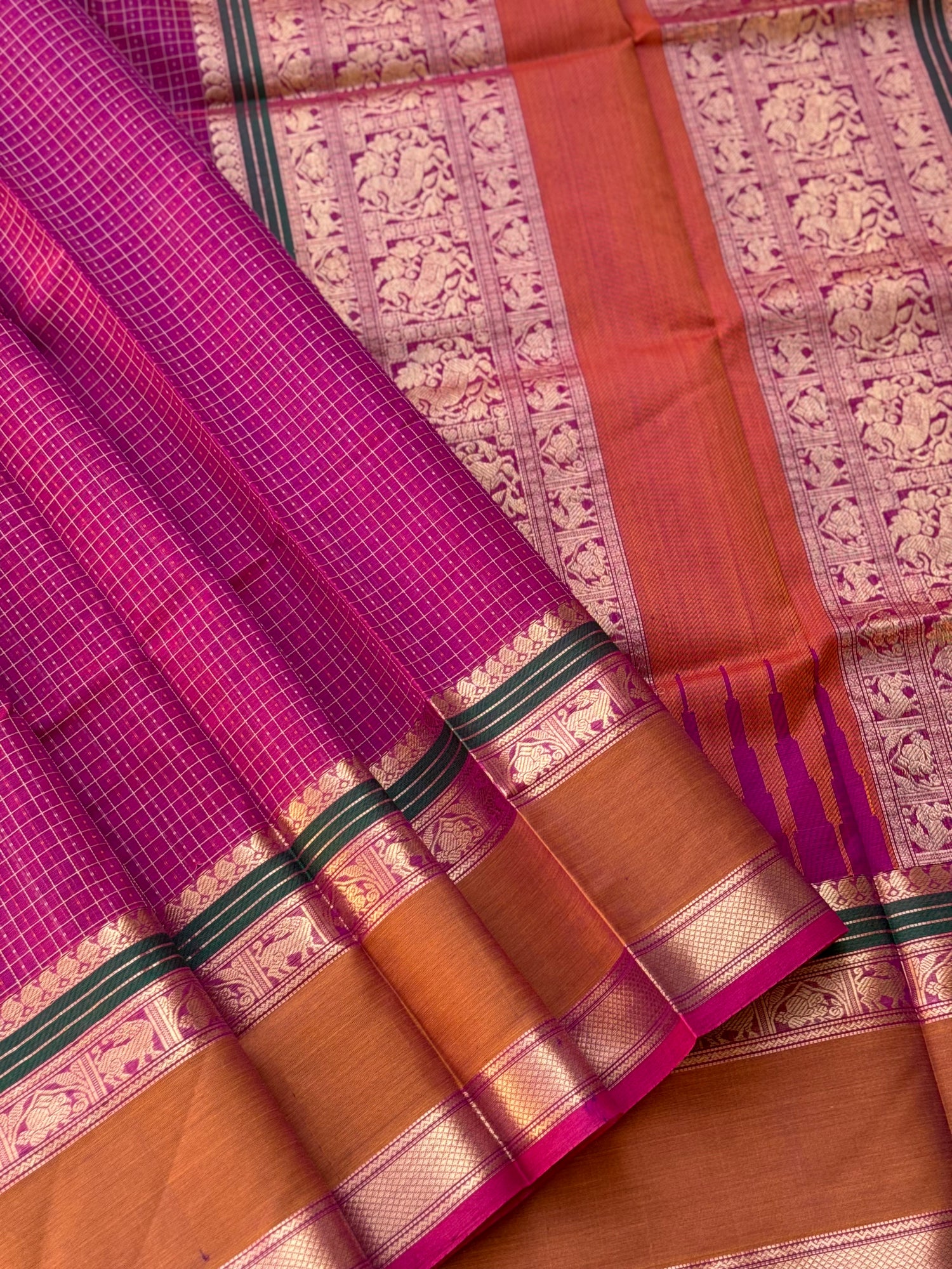 A gorgeous deep pink with lakhshadeepam buttas silk cotton saree