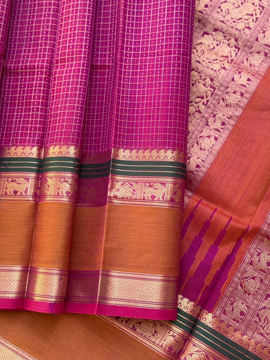 A gorgeous deep pink with lakhshadeepam buttas silk cotton saree