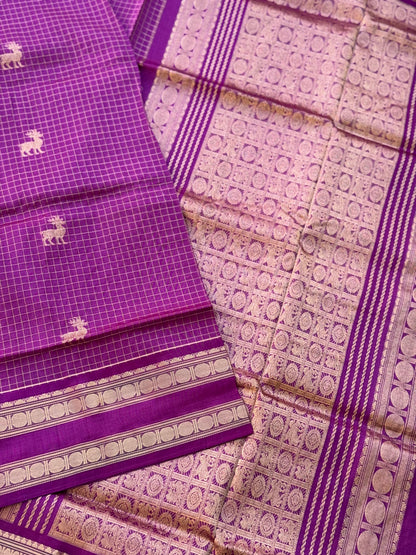 A gorgeous lilac shade handwoven zari stripes kanchi silk cotton saree