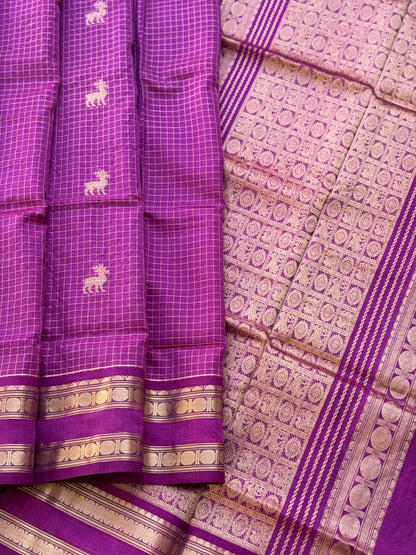 A gorgeous lilac shade handwoven zari stripes kanchi silk cotton saree