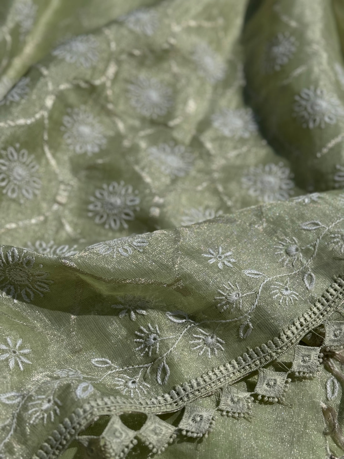 A stunner exclusive designer collective Matcha green all over Chikankari work on handwoven tissue silk