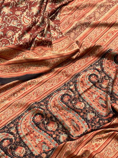 A double layered / double resist Handblock printed Ajrakh on heavy silk saree