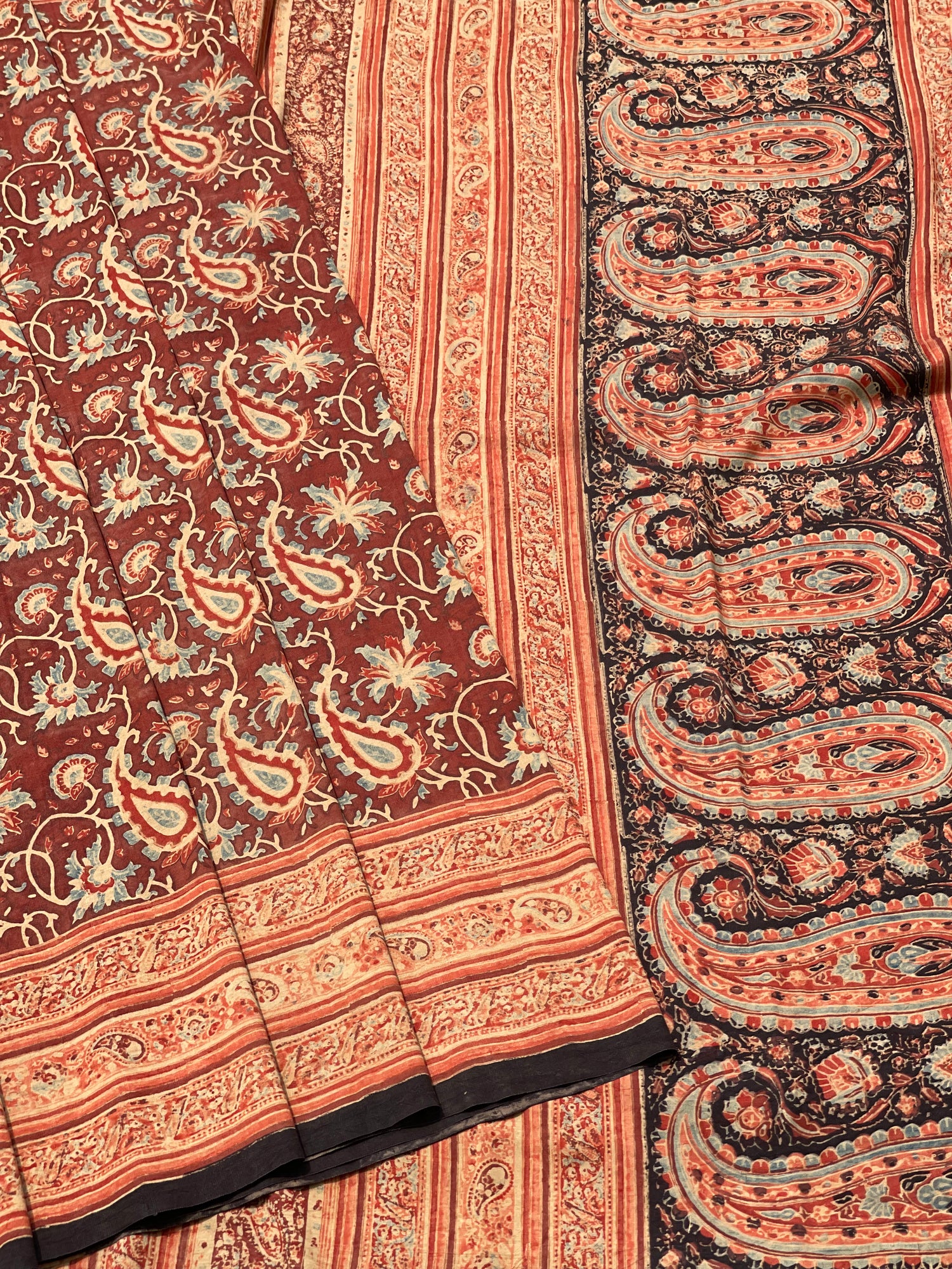 A double layered / double resist Handblock printed Ajrakh on heavy silk saree