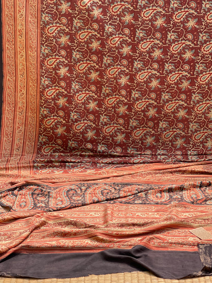 A double layered / double resist Handblock printed Ajrakh on heavy silk saree