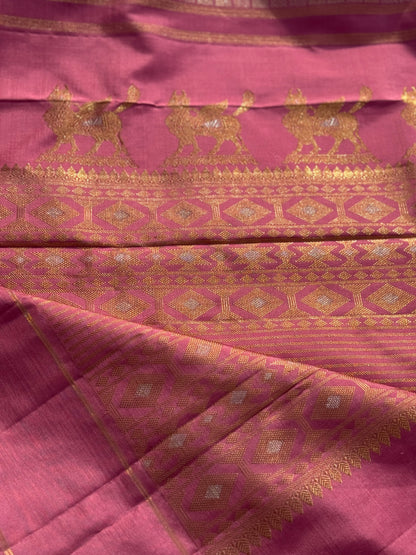 A Canvas of Legendary Artistry The Masterpiece 108 exquisite Kanchivaram silk  showcases kamadenu pallu in hot pink hue of the finest and rarest natural dye