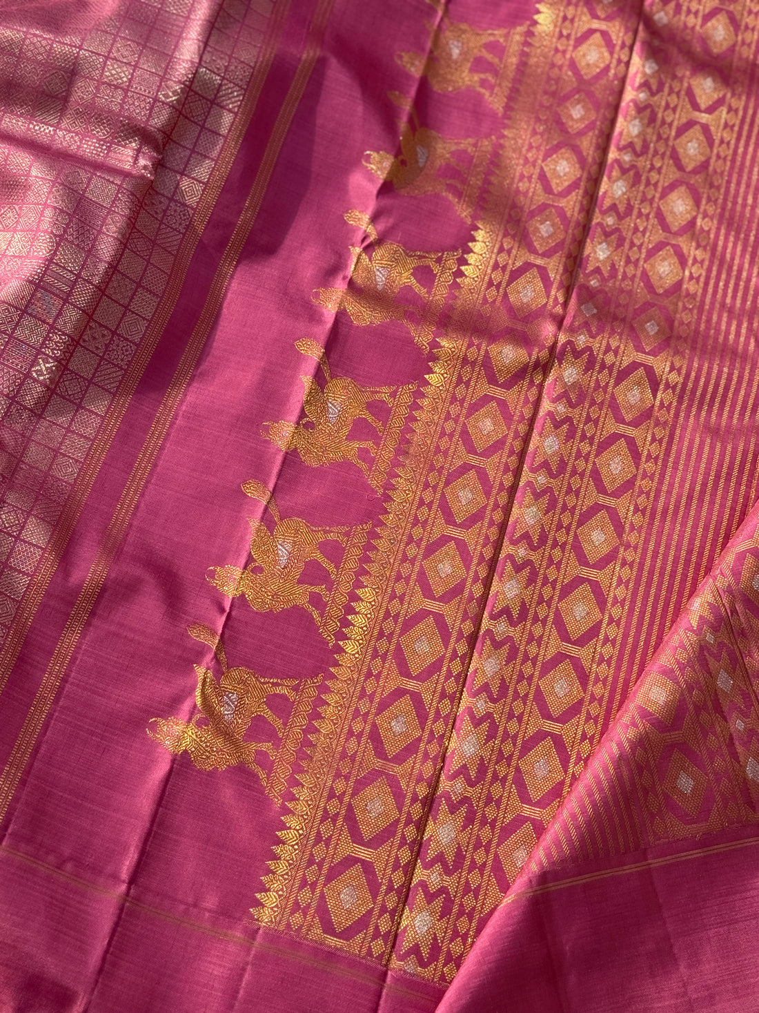 A Canvas of Legendary Artistry The Masterpiece 108 exquisite Kanchivaram silk showcases kamadenu pallu in hot pink hue of the finest and rarest natural dye