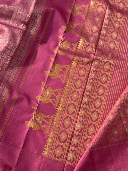 A Canvas of Legendary Artistry The Masterpiece 108 exquisite Kanchivaram silk  showcases kamadenu pallu in hot pink hue of the finest and rarest natural dye