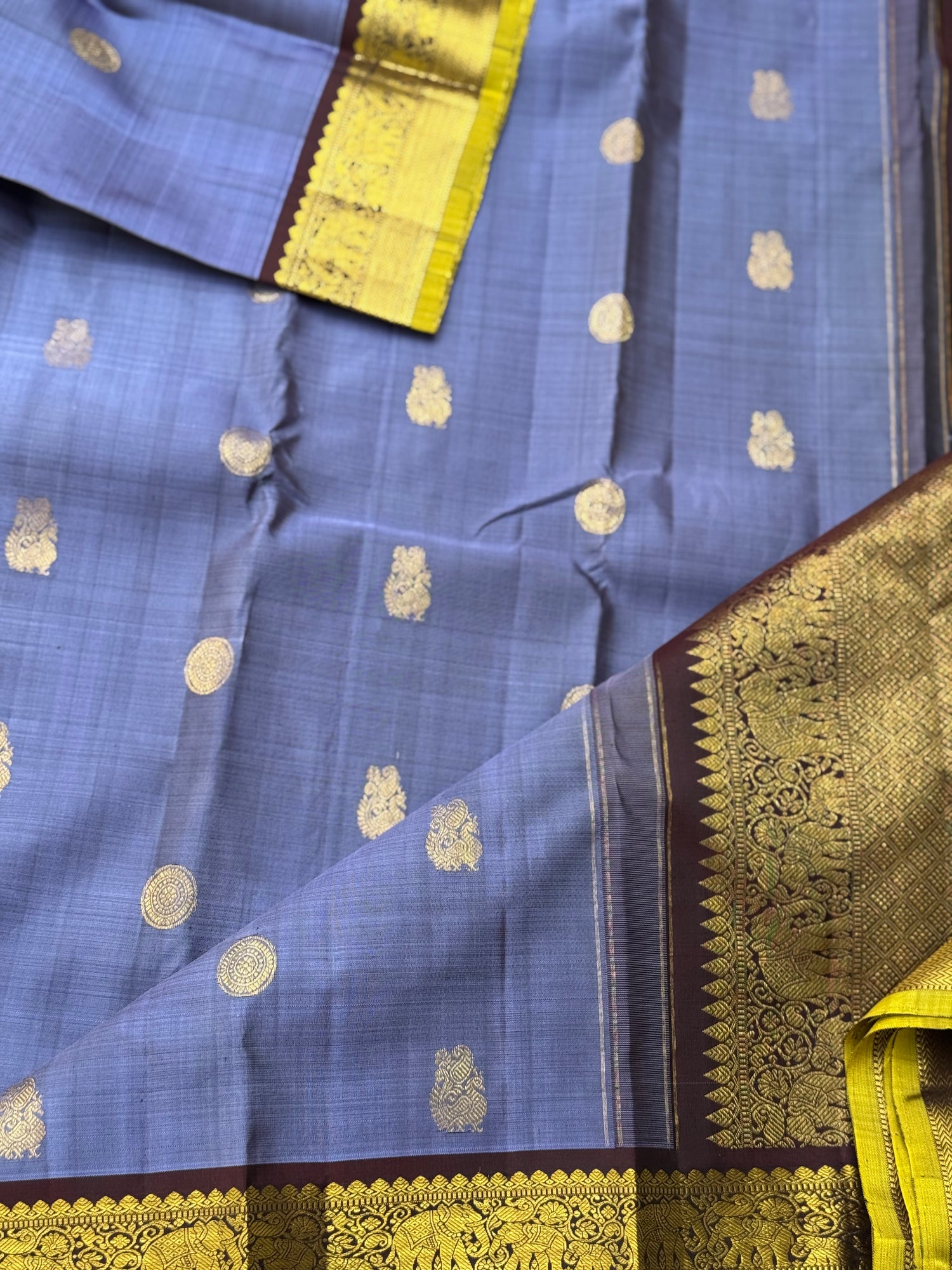 A stunner metallic powder blue korvai kanchivaram kanchivaram silk saree with annam chakkaram