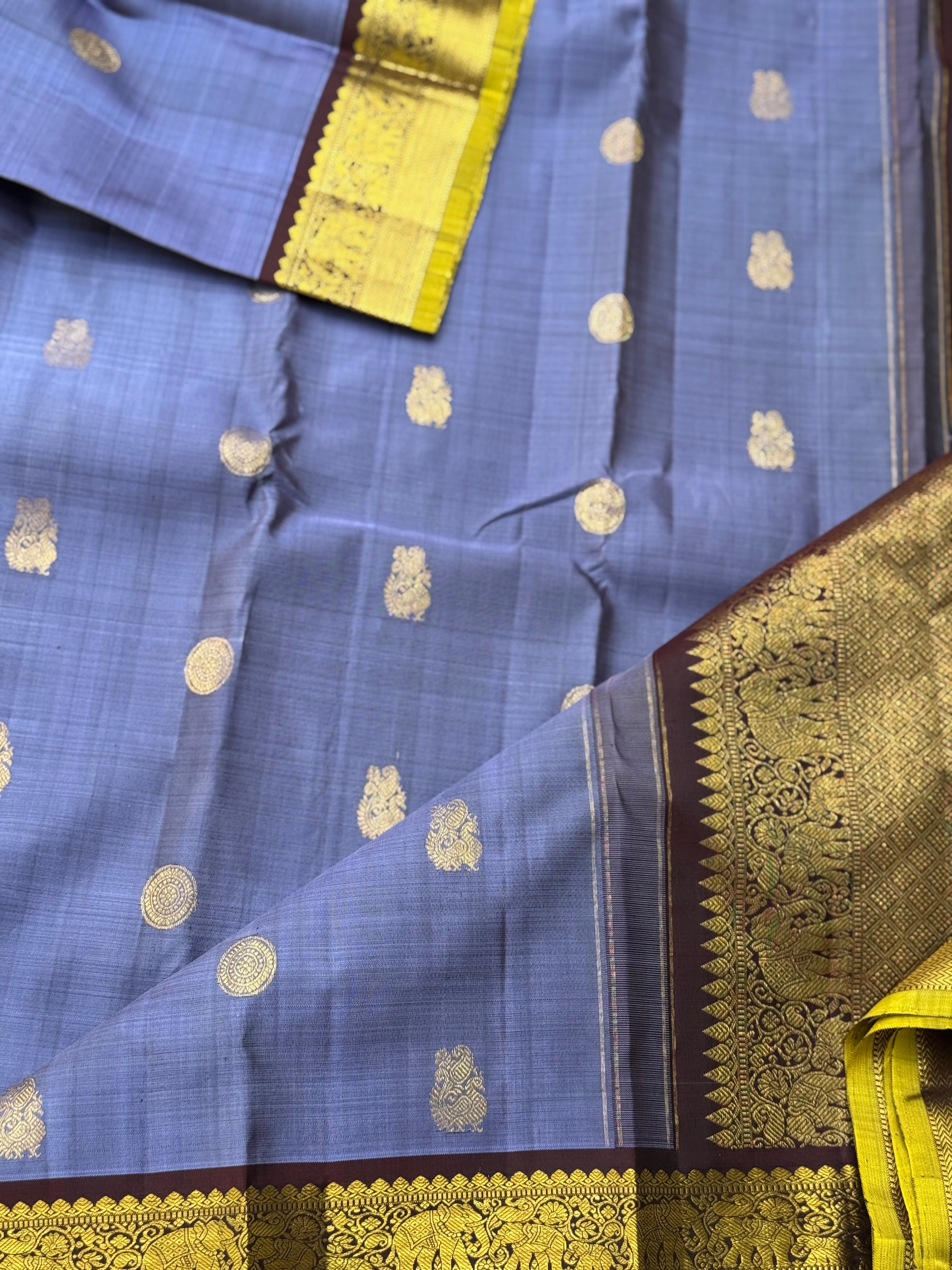 A stunner metallic powder blue korvai kanchivaram kanchivaram silk saree with annam chakkaram