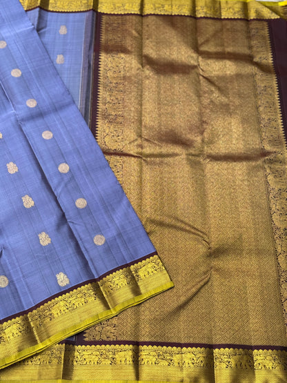 A stunner metallic powder blue korvai kanchivaram kanchivaram silk saree with annam chakkaram