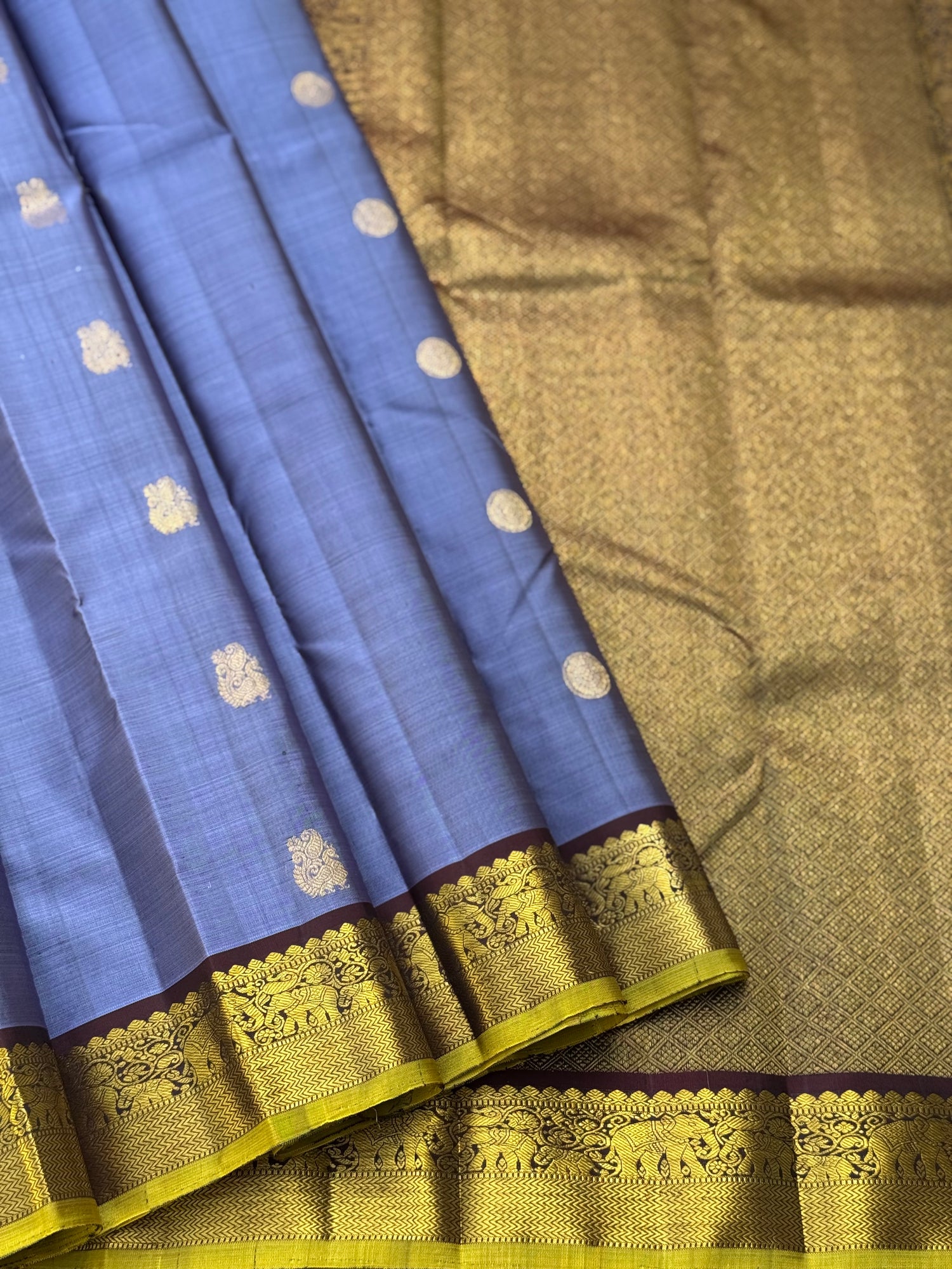 A stunner metallic powder blue korvai kanchivaram kanchivaram silk saree with annam chakkaram