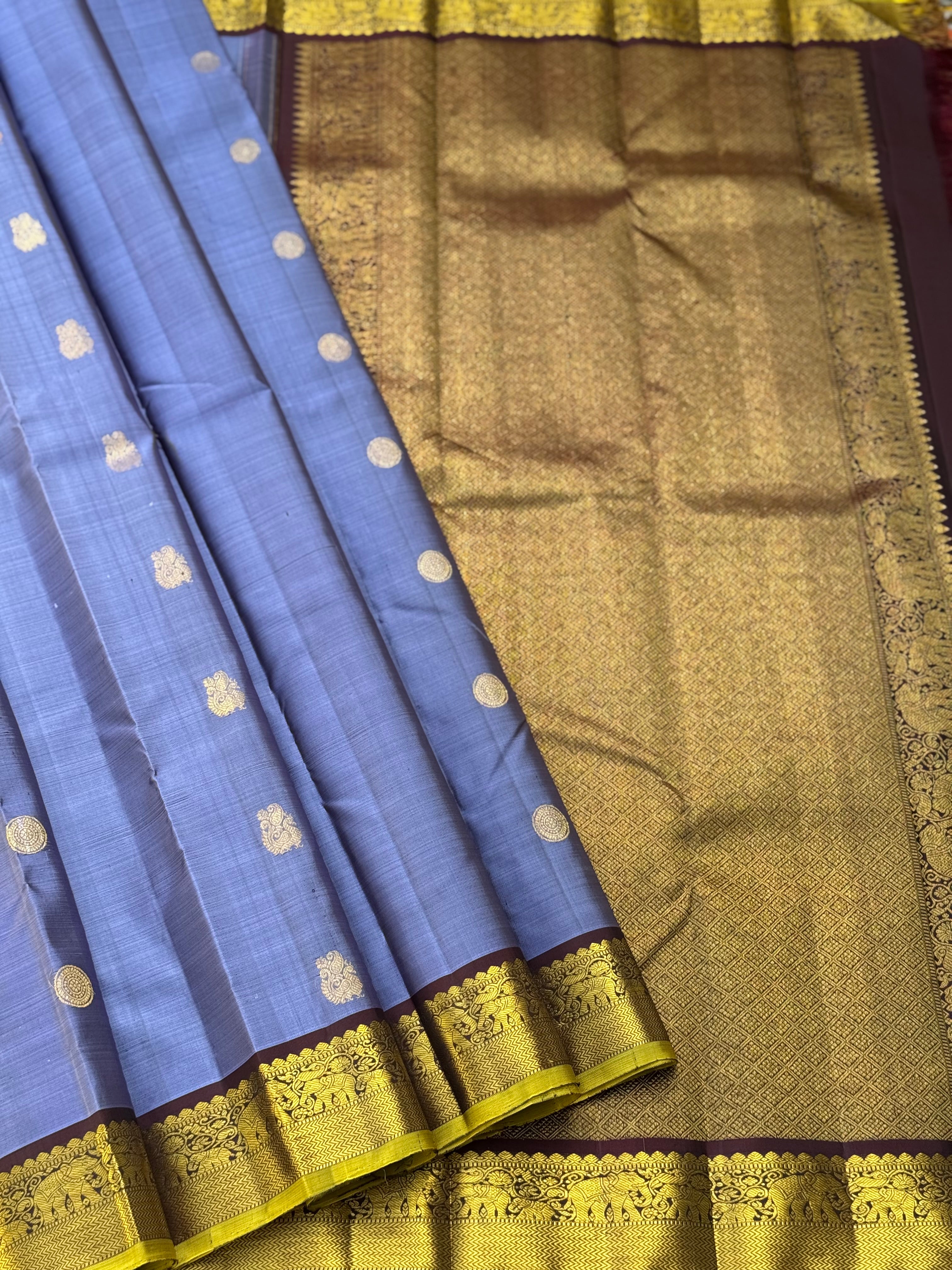 A stunner metallic powder blue korvai kanchivaram kanchivaram silk saree with annam chakkaram