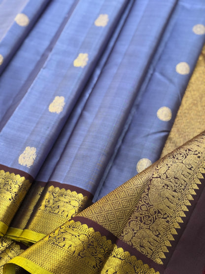 A stunner metallic powder blue korvai kanchivaram kanchivaram silk saree with annam chakkaram