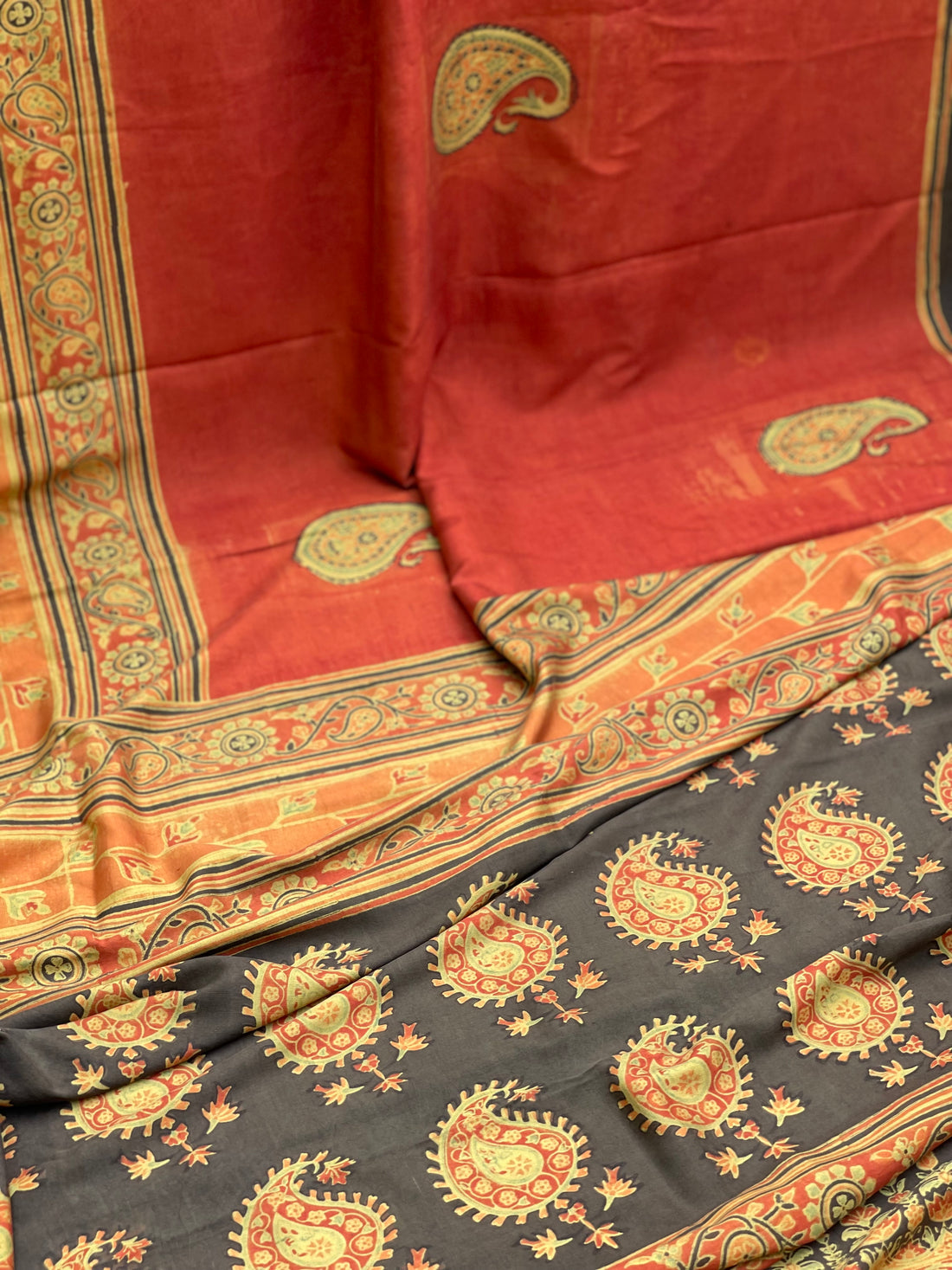A double layered / double resist Handblock printed Ajrakh on Heavy silk saree