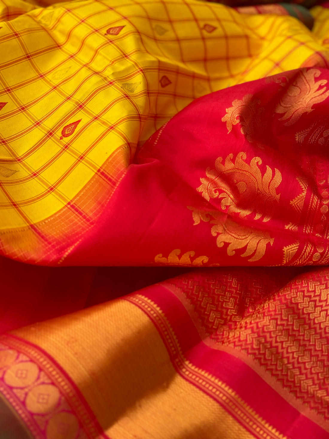 A gorgeous haldi with kumkum red handwoven gadwal silk saree