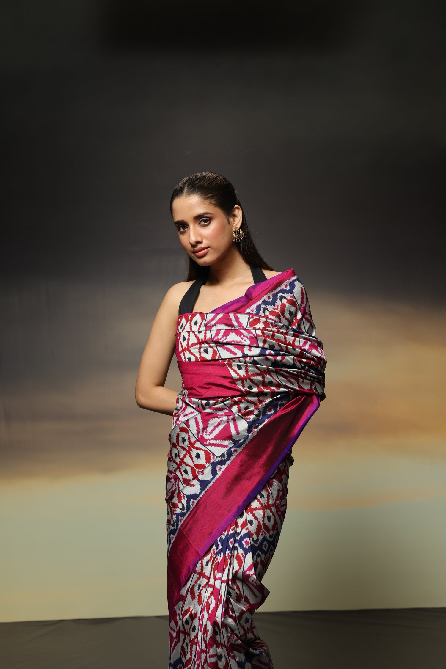 A stunning metallic colour with shot pink purple Uzbek silk ikkat saree inspired by the treasured archive pieces of the Victoria and Albert museum