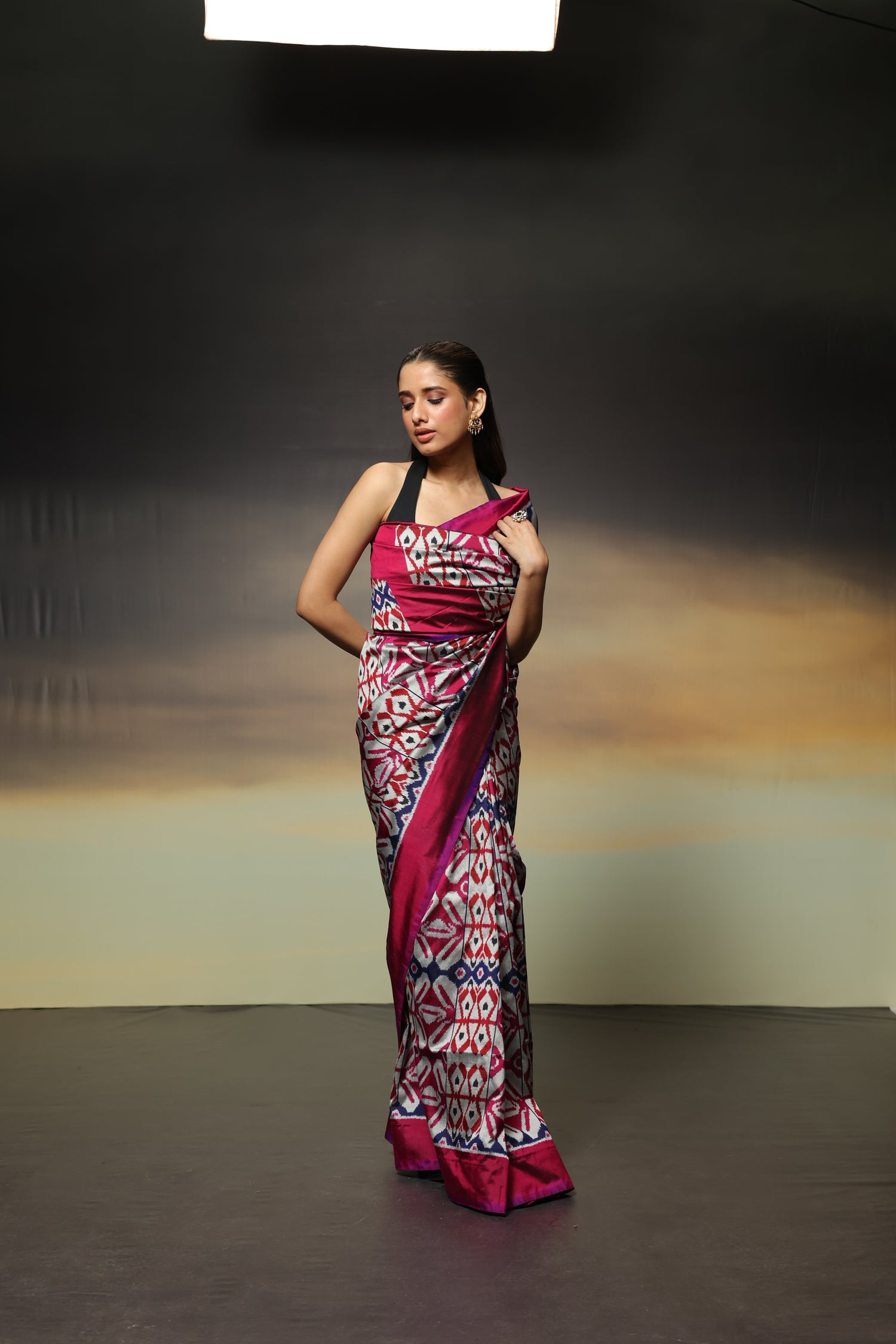 A stunning metallic colour with shot pink purple Uzbek silk ikkat saree inspired by the treasured archive pieces of the Victoria and Albert museum
