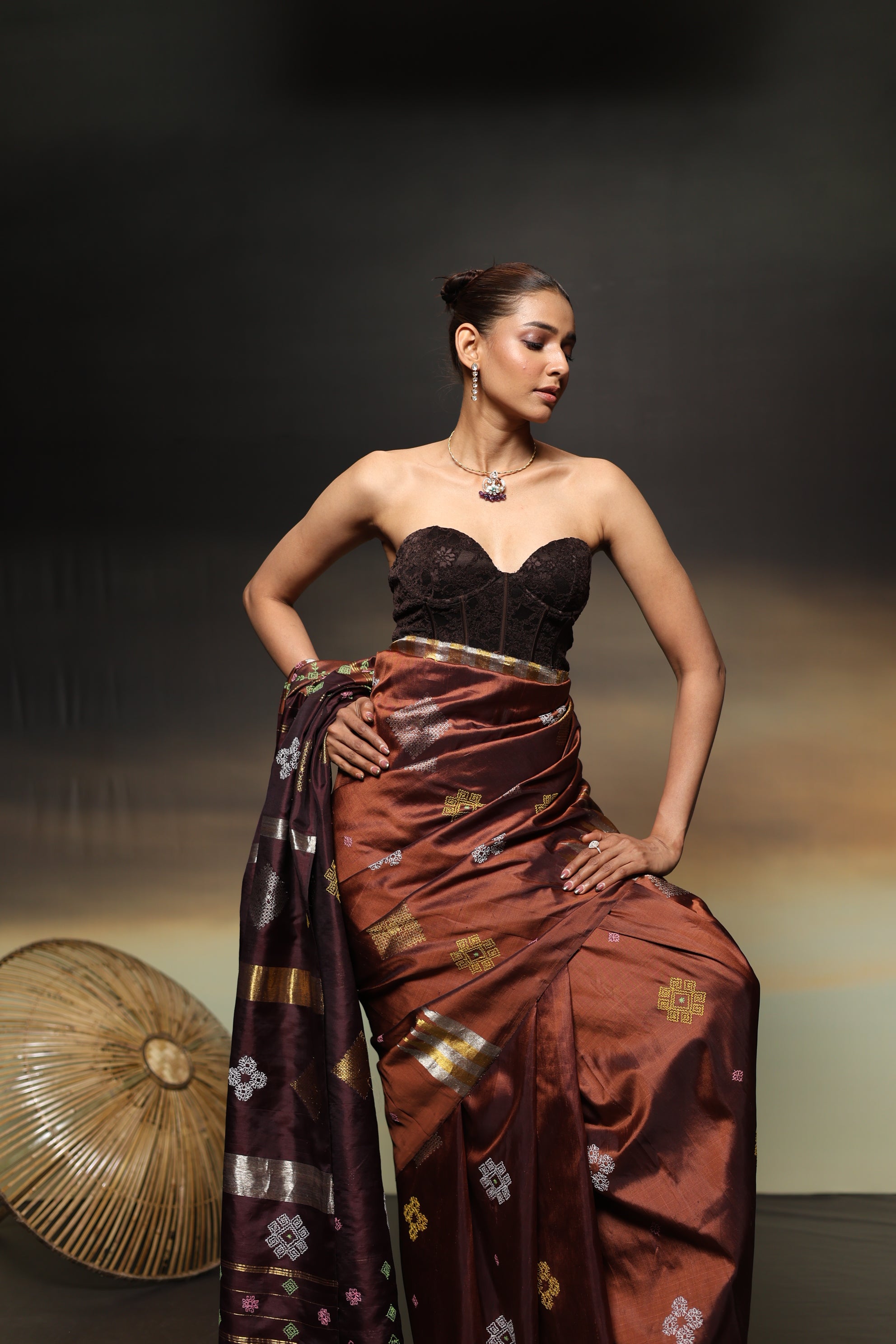 A designer exclusive Choco brown and caramel brown shade ettukol kanchivaram silk saree with kasuti hand embroidery