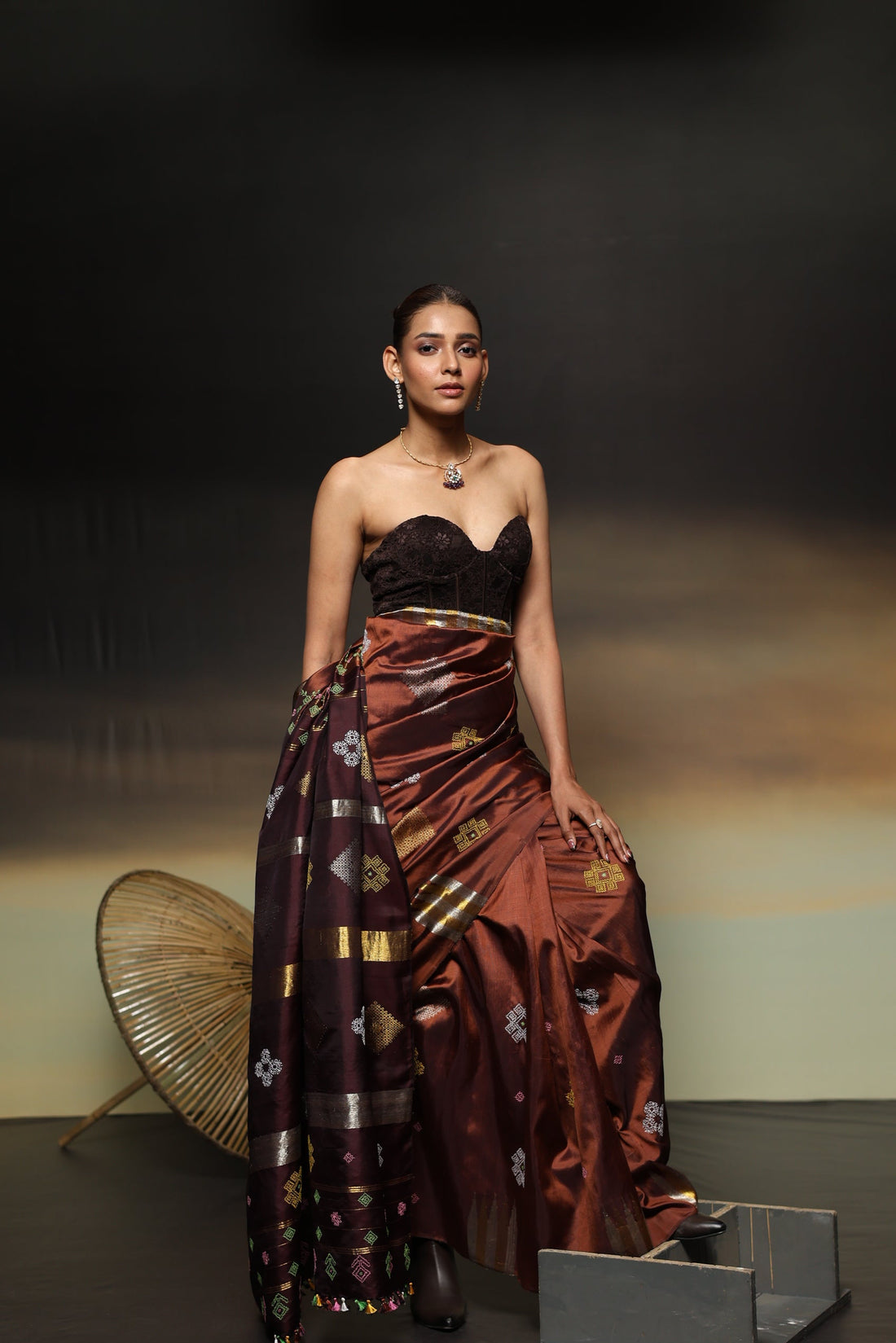 A designer exclusive Choco brown and caramel brown shade ettukol kanchivaram silk saree with kasuti hand embroidery