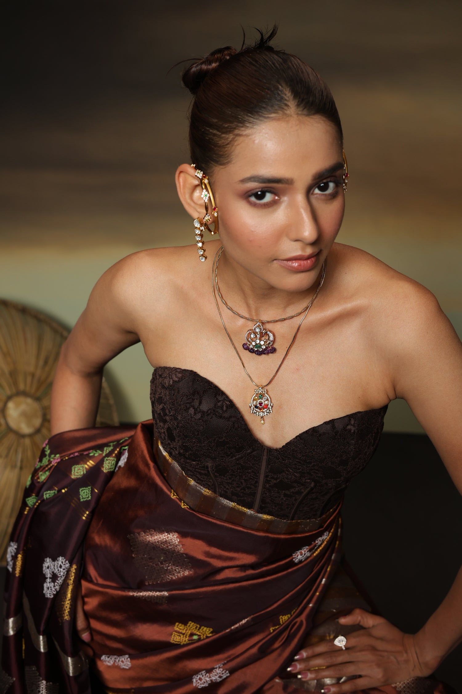 A designer exclusive Choco brown and caramel brown shade ettukol kanchivaram silk saree with kasuti hand embroidery