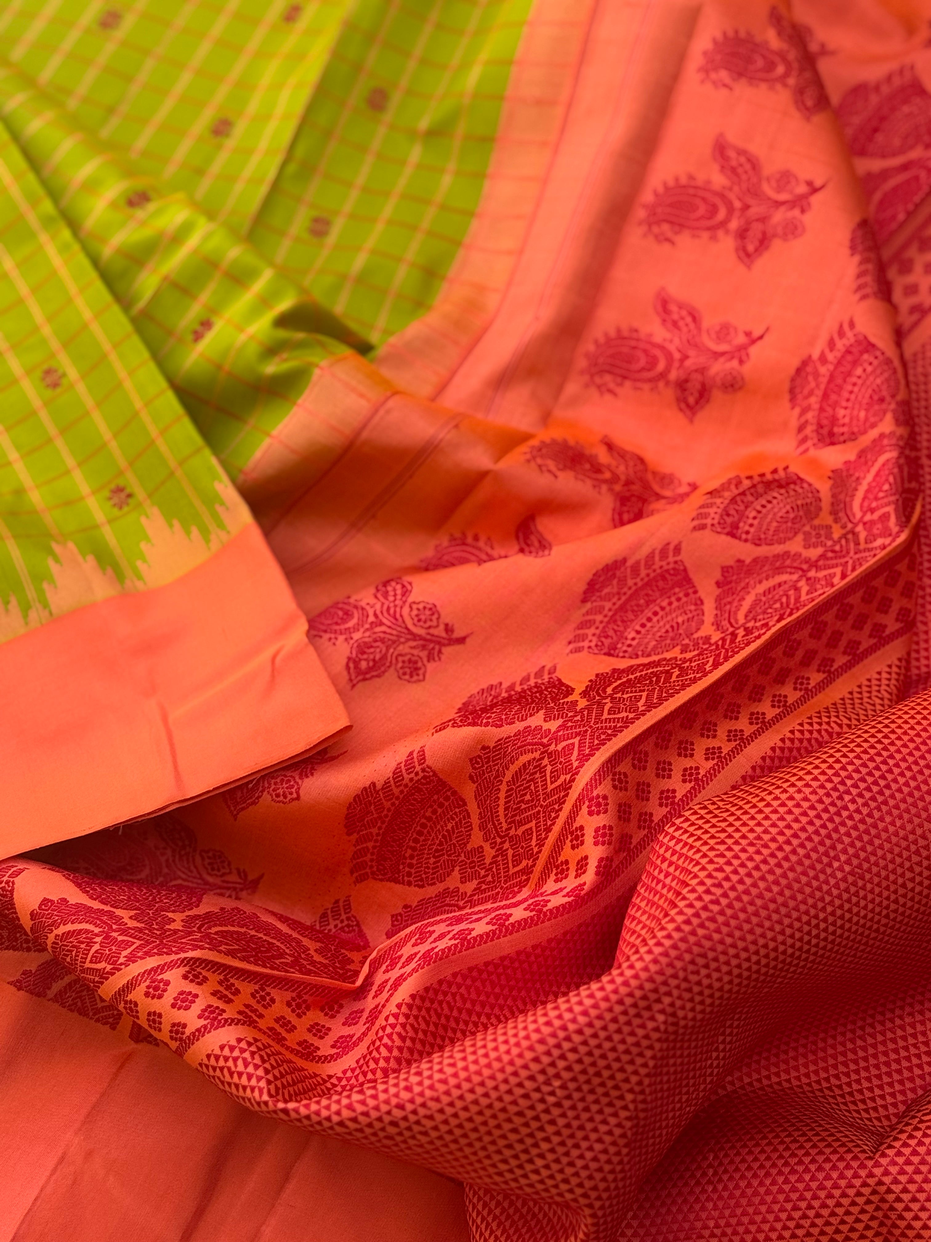 PastelOrange with fern green Gadwal silk saree with complete threadwork