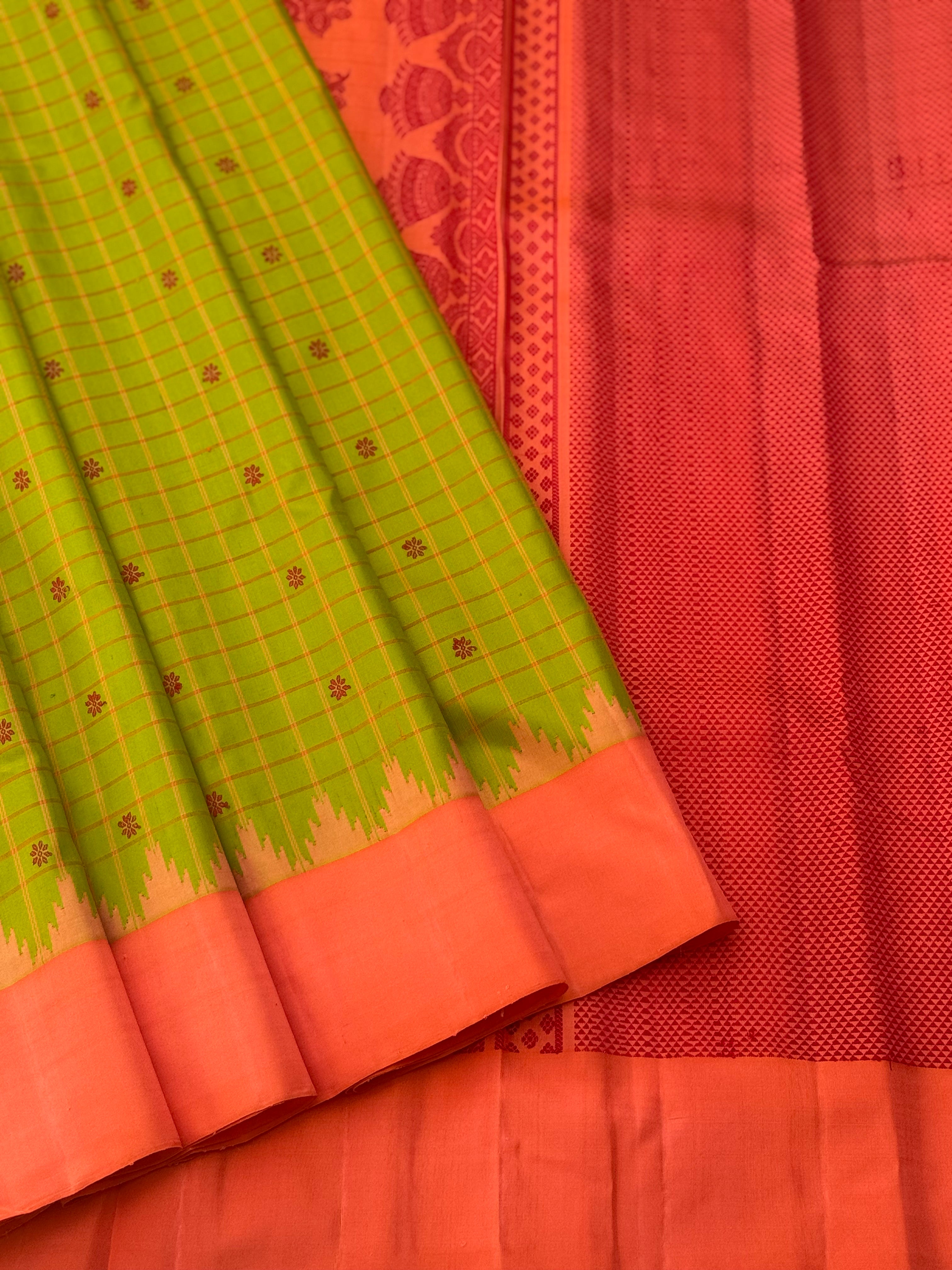 PastelOrange with fern green Gadwal silk saree with complete threadwork