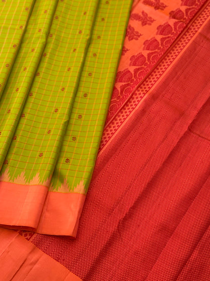 PastelOrange with fern green Gadwal silk saree with complete threadwork