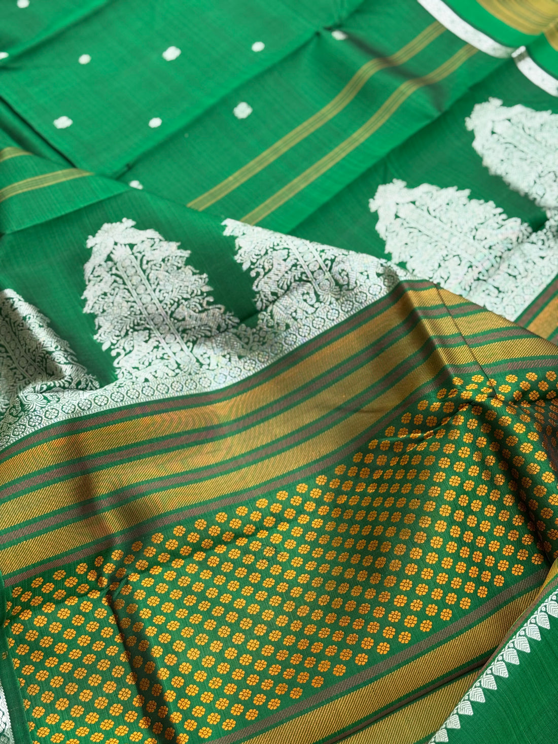 An elegant masterpiece forest green silver zari woven contemporary vanasingaram kanchivaram silk saree