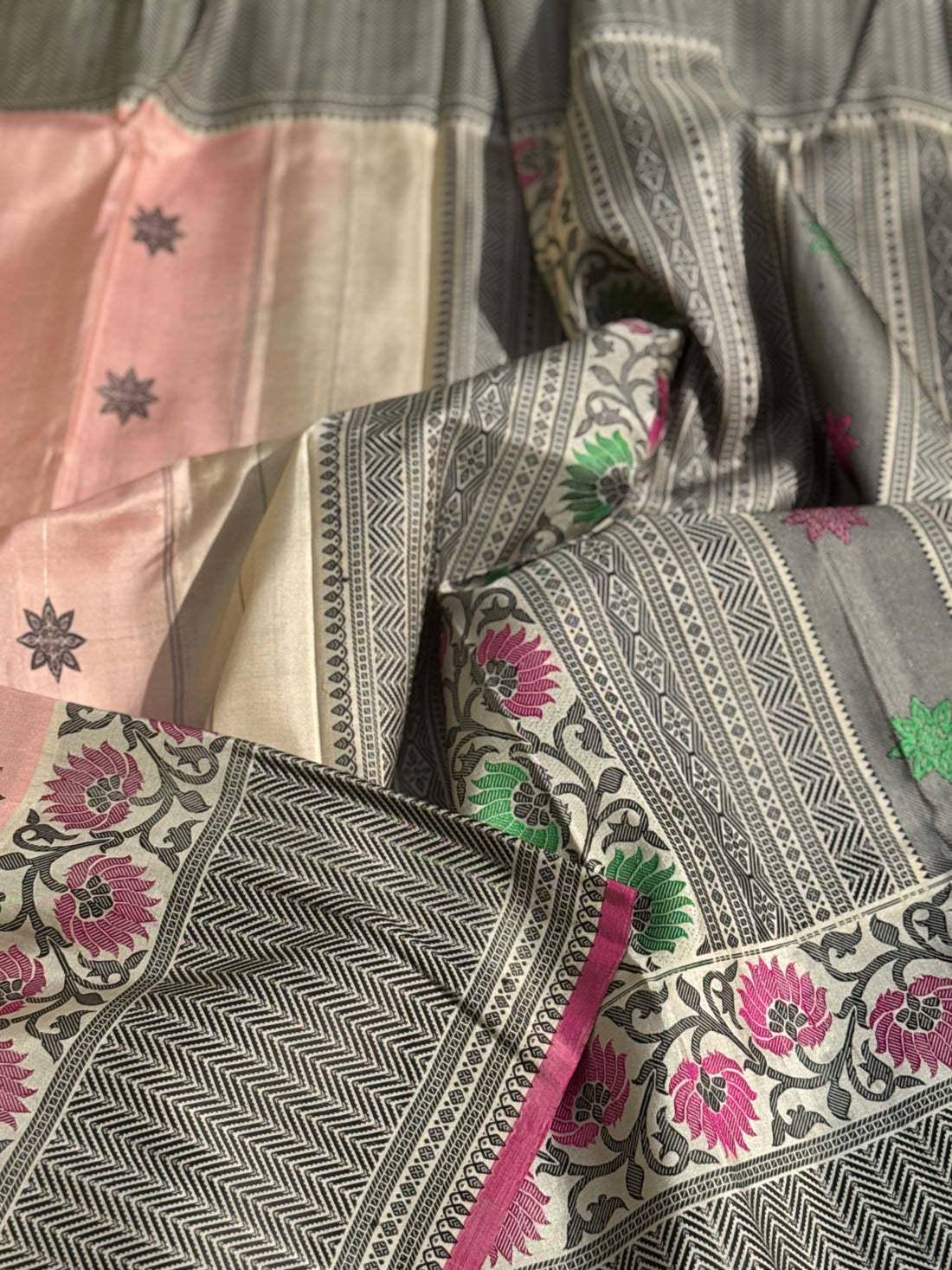 A gorgeous No Zari ivory with peach and pink handwoven soft and lustrous gadwal silk saree