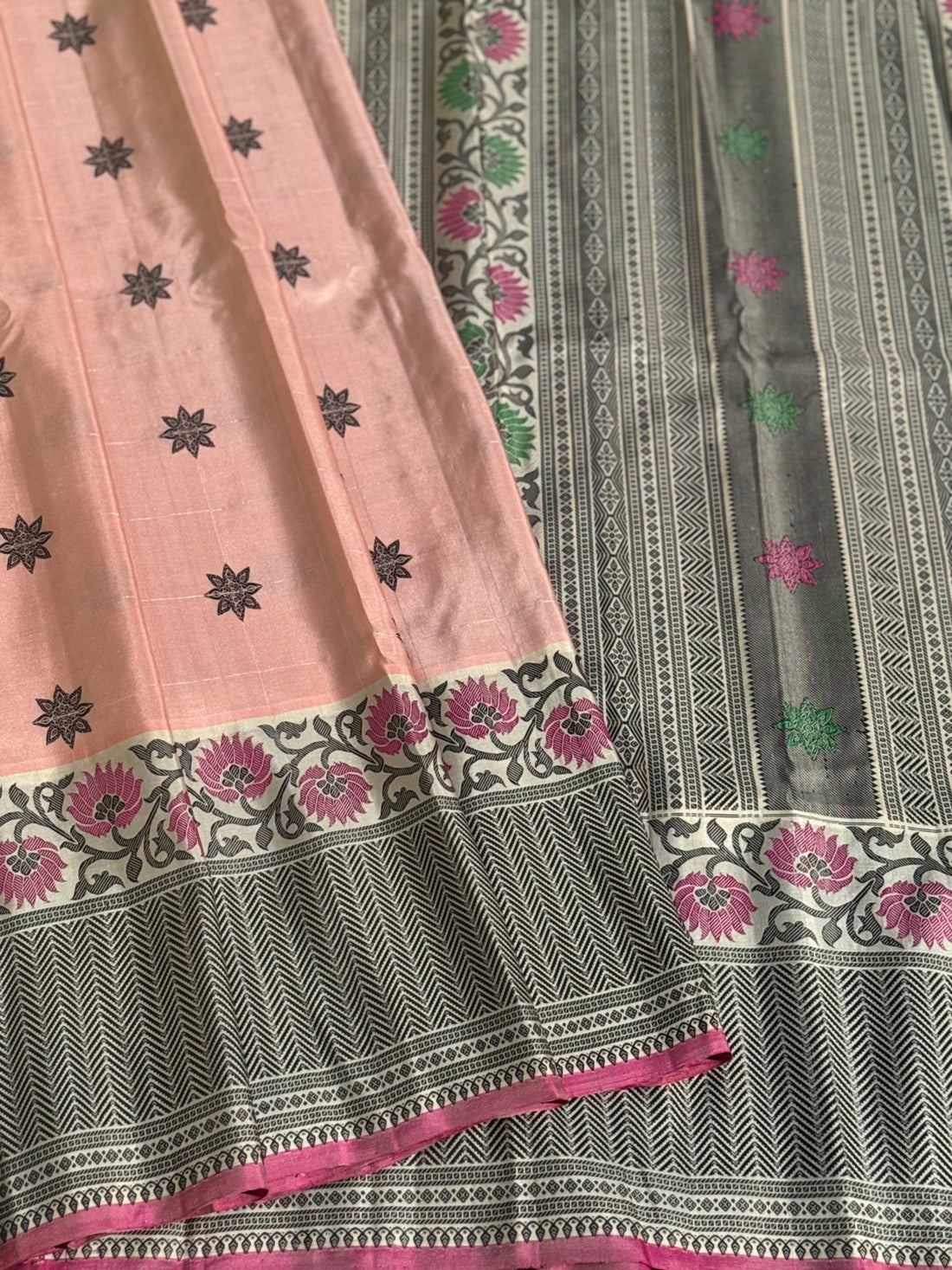 A gorgeous No Zari ivory with peach and pink handwoven soft and lustrous gadwal silk saree