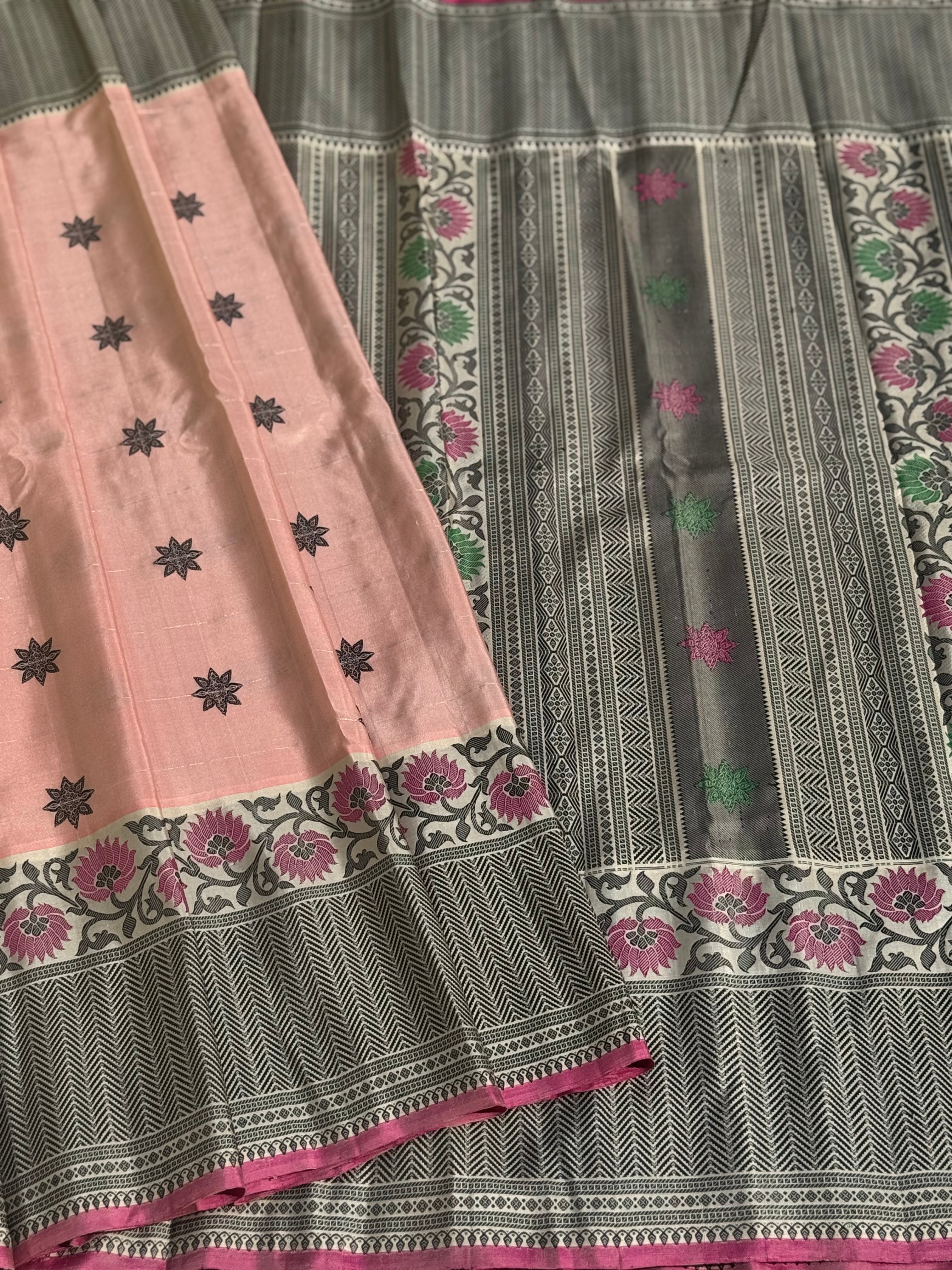 A gorgeous No Zari ivory with peach and pink handwoven soft and lustrous gadwal silk saree