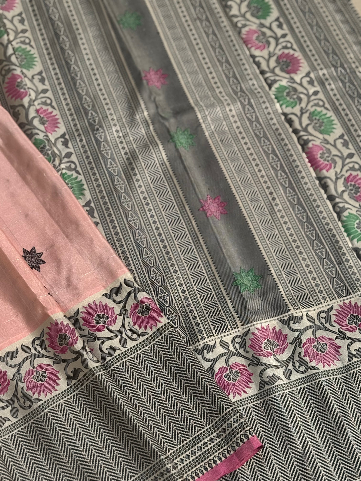 A gorgeous No Zari ivory with peach and pink handwoven soft and lustrous gadwal silk saree