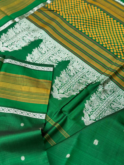 An elegant masterpiece forest green silver zari woven contemporary vanasingaram kanchivaram silk saree