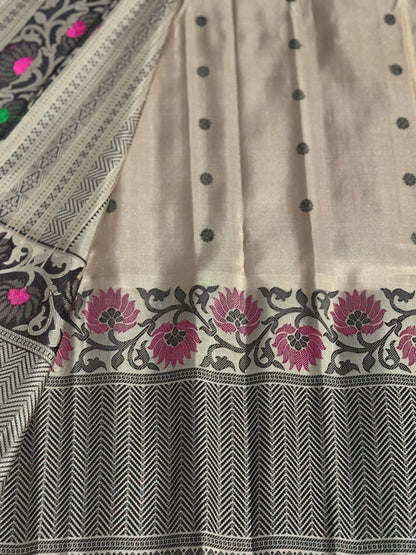 A gorgeous No Zari ivory with peach and pink handwoven soft and lustrous gadwal silk saree