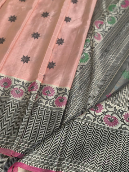 A gorgeous No Zari ivory with peach and pink handwoven soft and lustrous gadwal silk saree