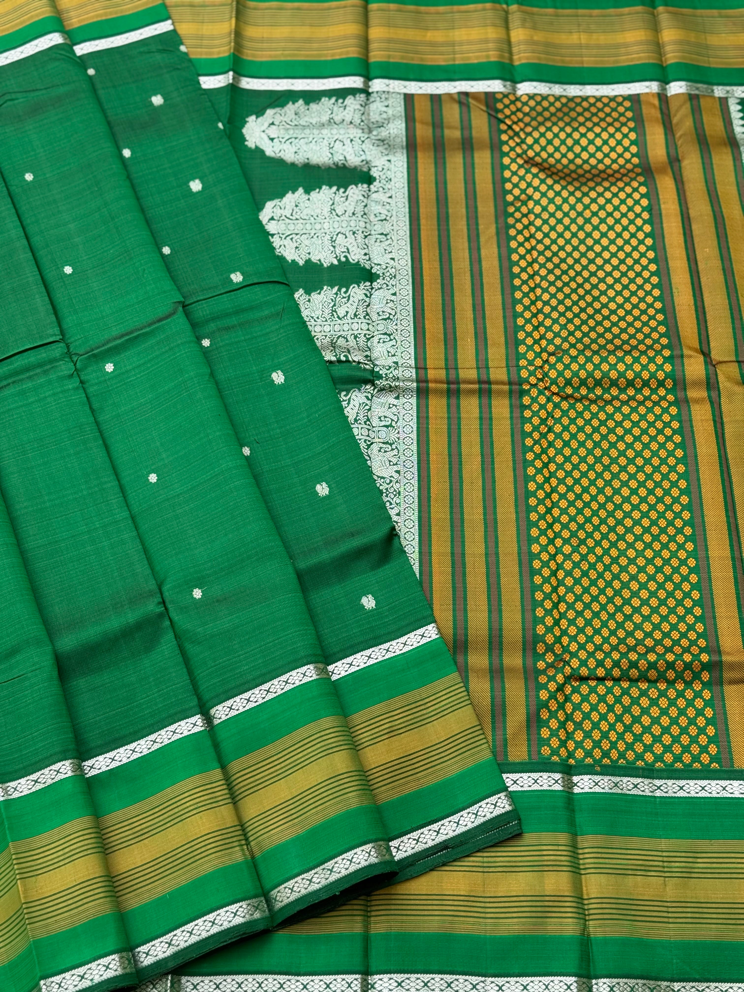 An elegant masterpiece forest green silver zari woven contemporary vanasingaram kanchivaram silk saree